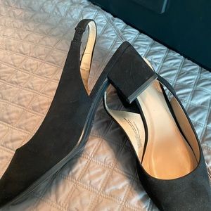 Black chunky low heel, sling back.